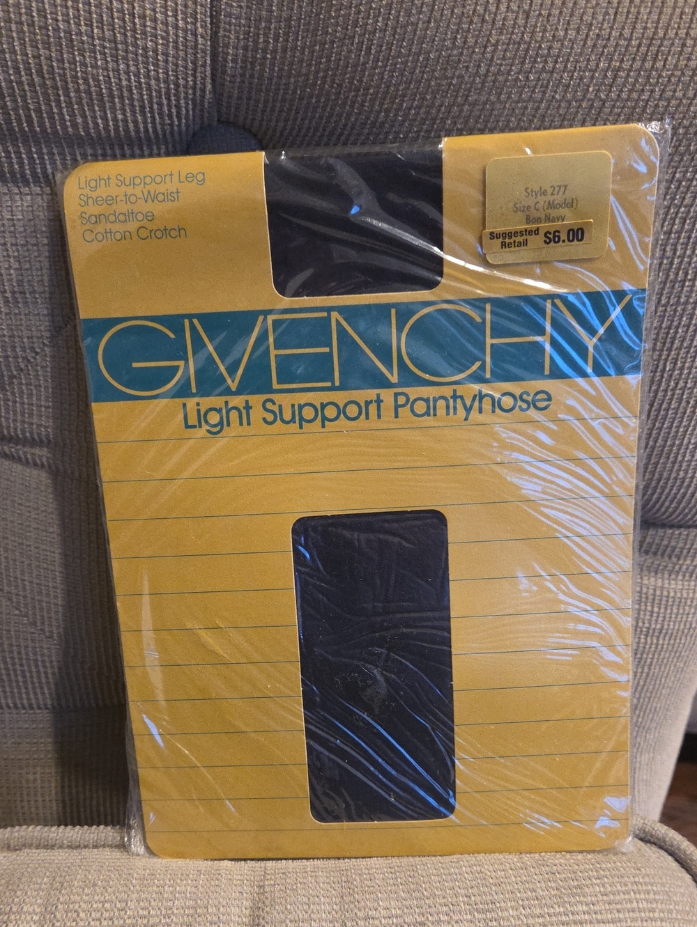 Givenchy Yellow Packaging with Navy Pantyhose Insert
